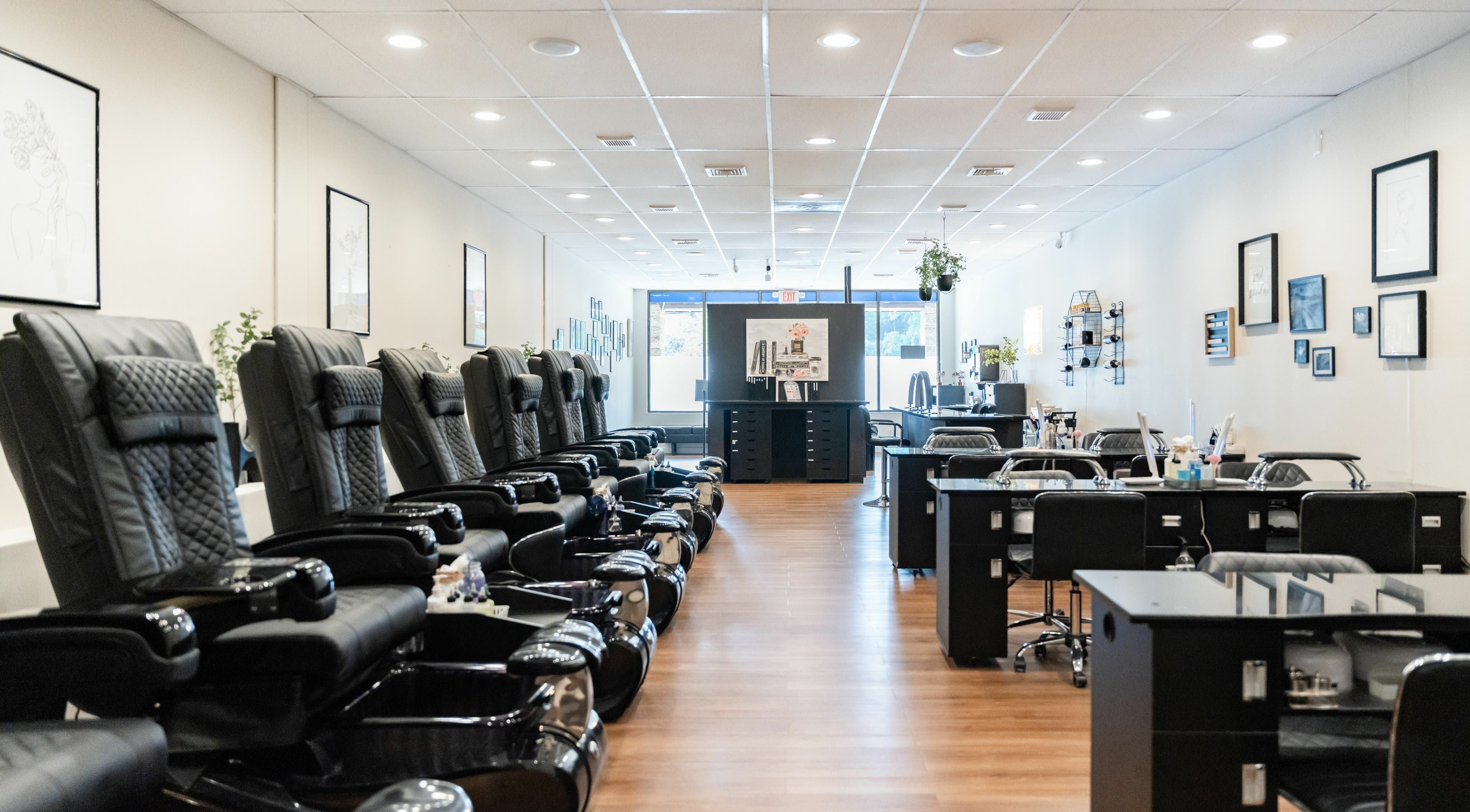 Spacious interior of Onyx Nail Bar in Voorhees Township, New Jersey, US with elegant pedicure chairs.