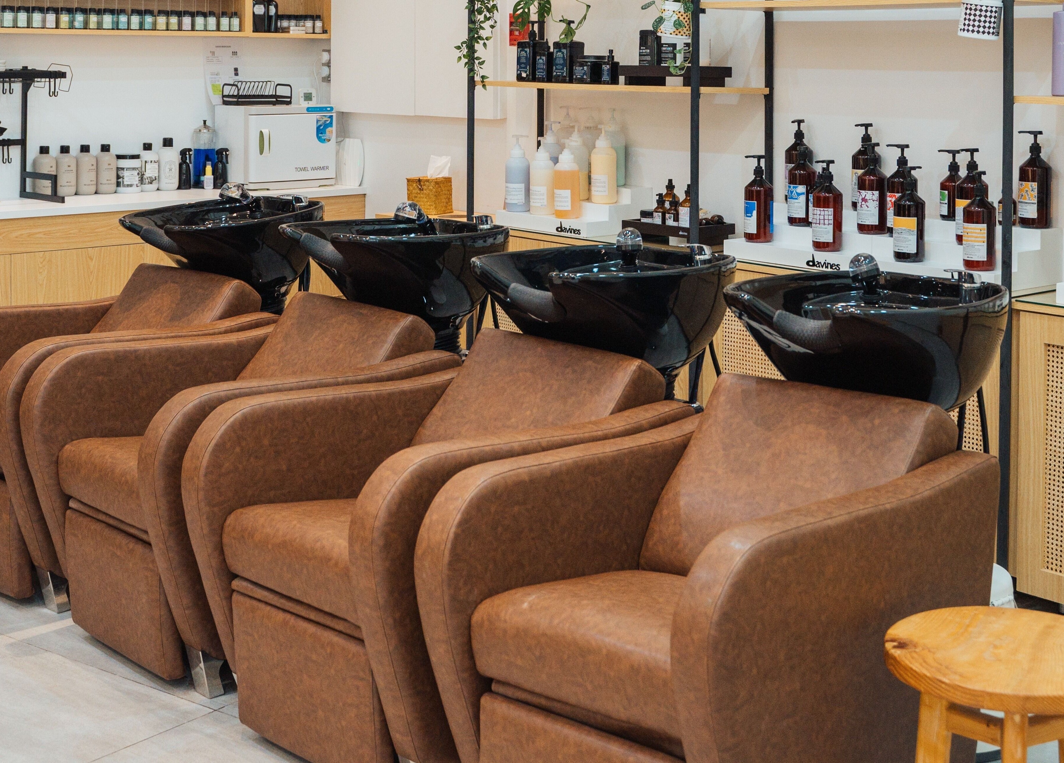 Elegant wash stations at Boho Salon AD, Abu Dhabi, AE, showcasing premium hair care.