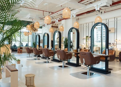 Chic and modern interior of Boho Salon DXB, Dubai, Dubai, AE, showcasing elegant styling stations.