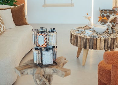 Cozy interior of Boho Salon DXB featuring rustic tables and cushions, Dubai, Dubai, AE.