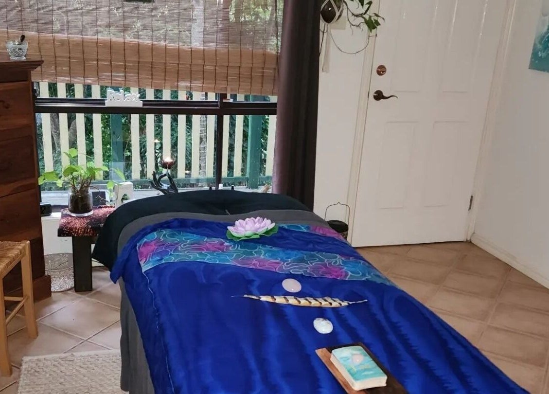 Calm massage room at Earth Magic with Suzie Maxwell, Currumbin Waters, Queensland, AU. Inviting, peaceful ambiance.