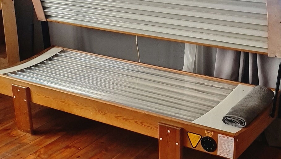 Relaxing sunbed at YM Nails Beauty & Skincare, Potchefstroom, North West, ZA invites tranquility and warmth.