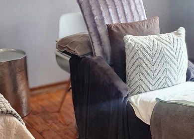Comfortable seating at YM Nails Beauty & Skincare, Potchefstroom, North West, ZA, for a relaxing experience.