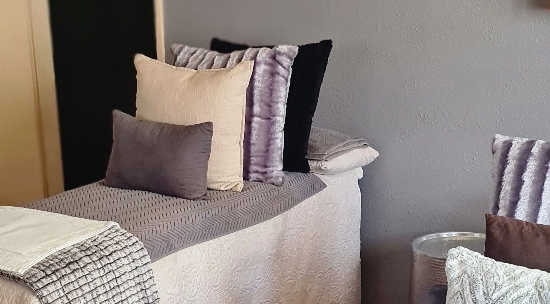 Modern massage bed with plush pillows at YM Sculptures, Potchefstroom, North West, ZA.