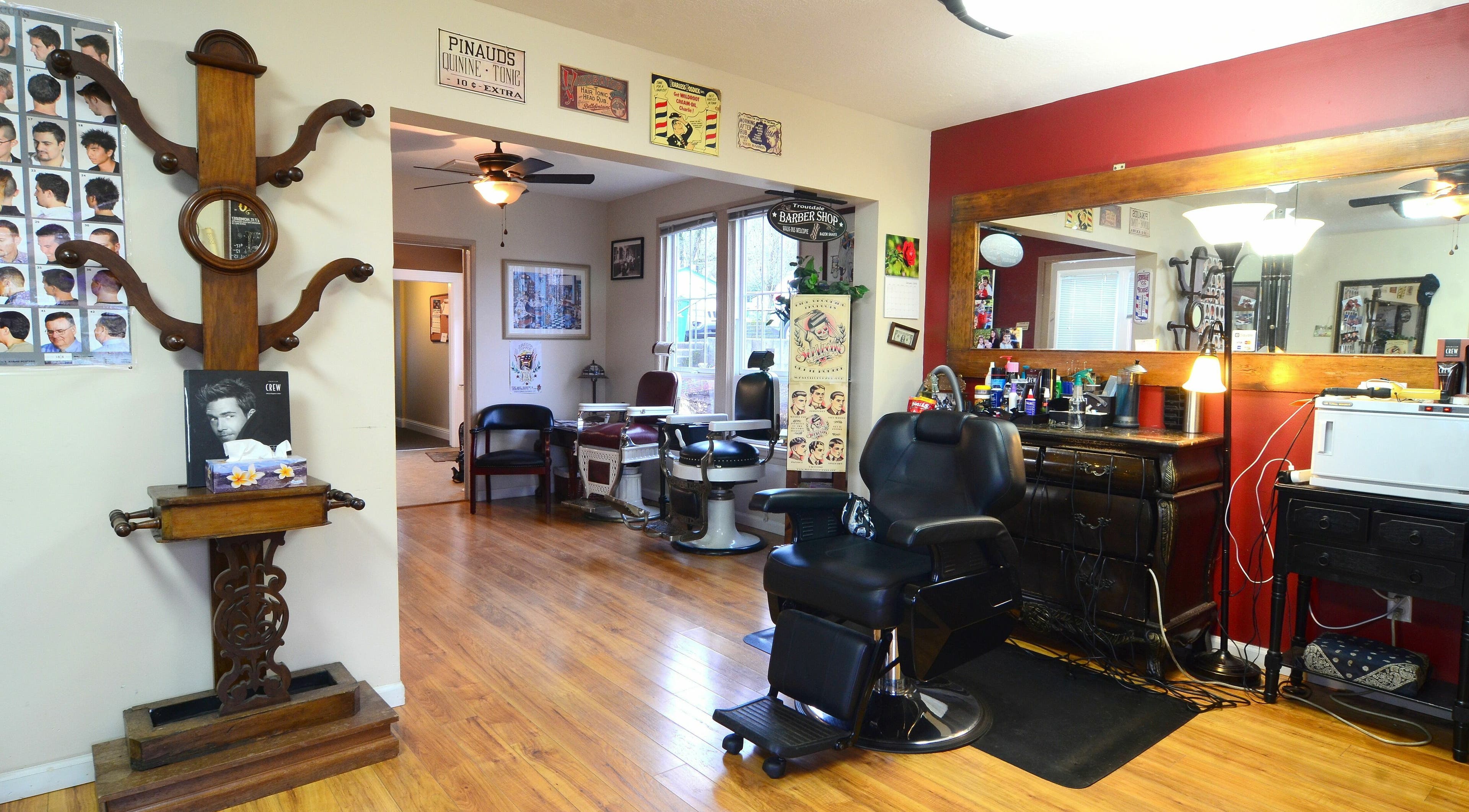 Classic interior of Historic Troutdale Barbershop in Troutdale, Oregon, US, featuring vintage barber chairs.