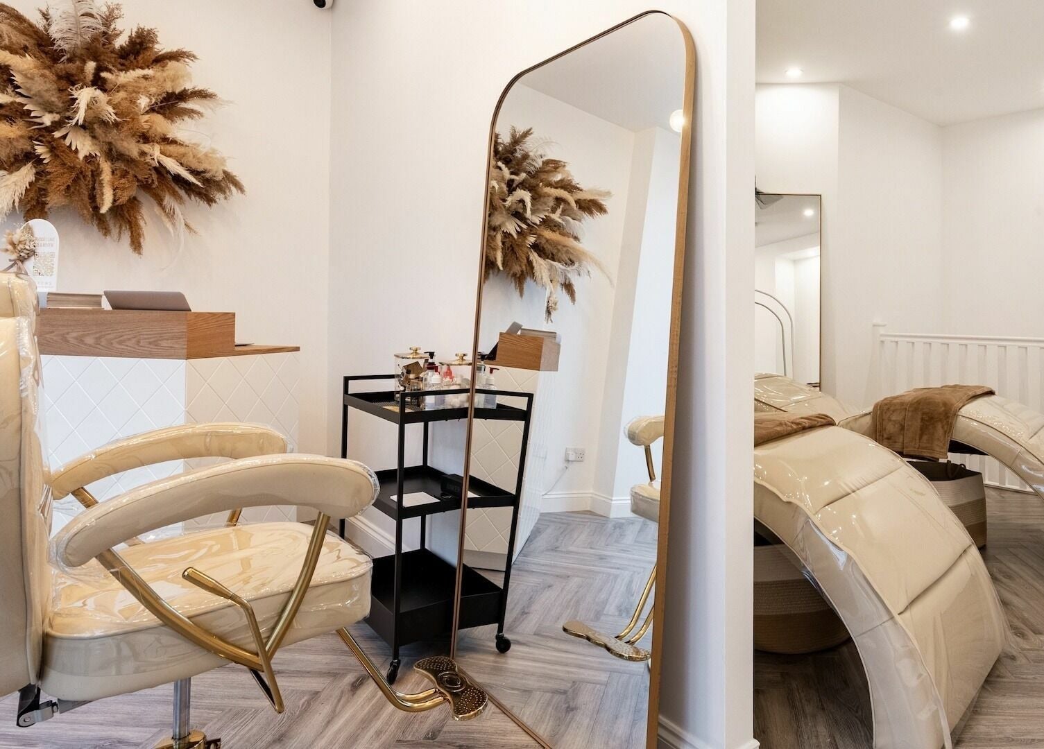 Elegant interior of SO Brows in London, England, GB with chic decor and modern seating.