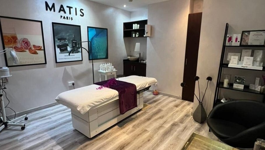 Tranquil treatment room at Salon 971, Dubai, Dubai, AE, with spa bed and elegant decor.