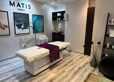 Tranquil treatment room at Salon 971, Dubai, Dubai, AE, with spa bed and elegant decor.