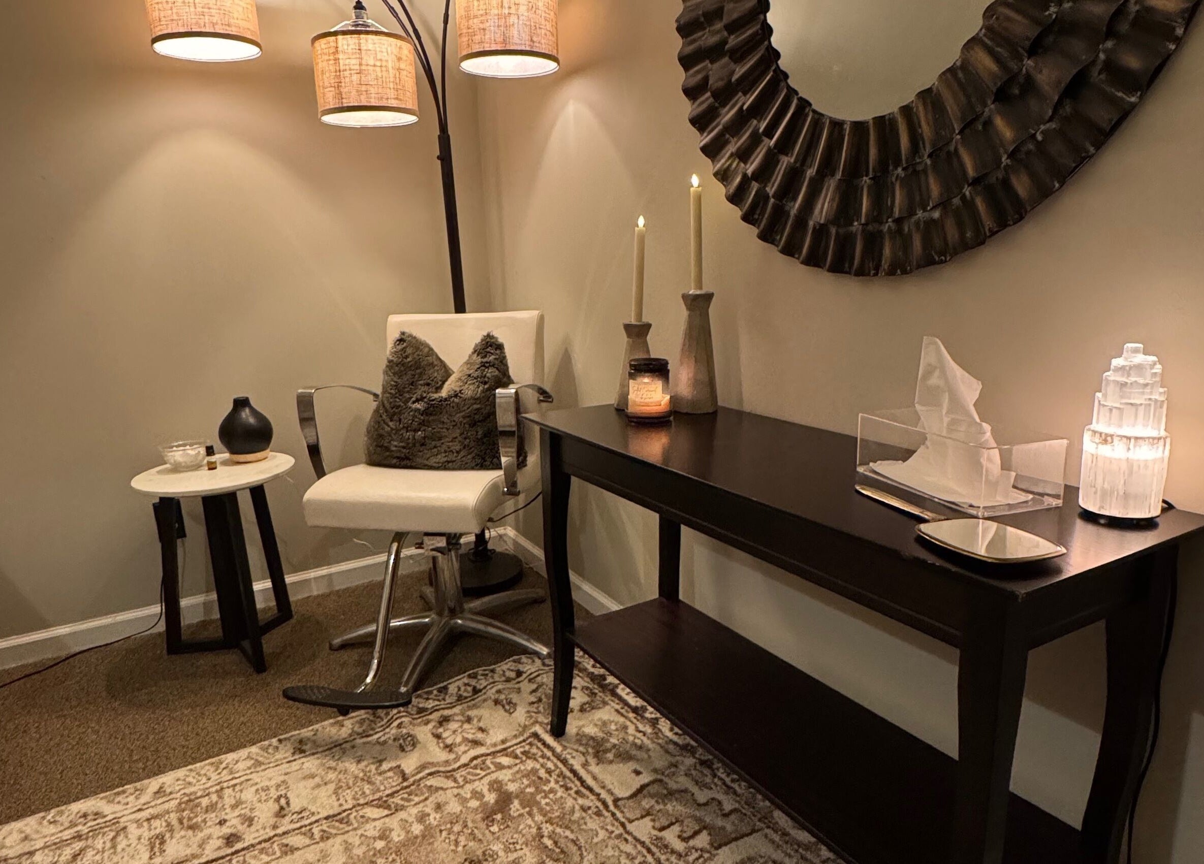 Inviting seating area at Brow Babes GA in Gainesville, Georgia, US showcasing modern decor and soft lighting.