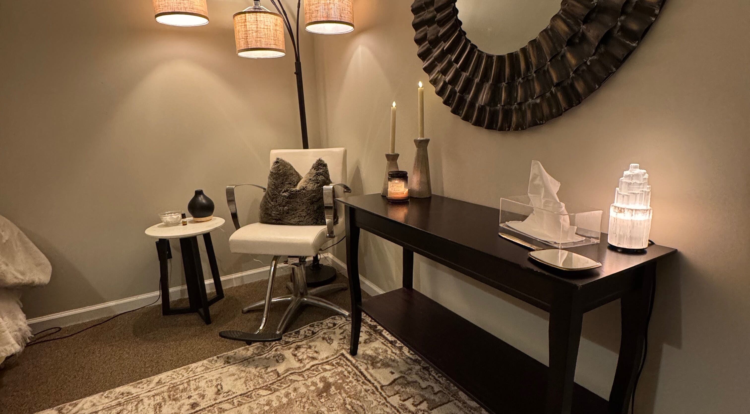 Inviting seating area at Brow Babes GA in Gainesville, Georgia, US showcasing modern decor and soft lighting.