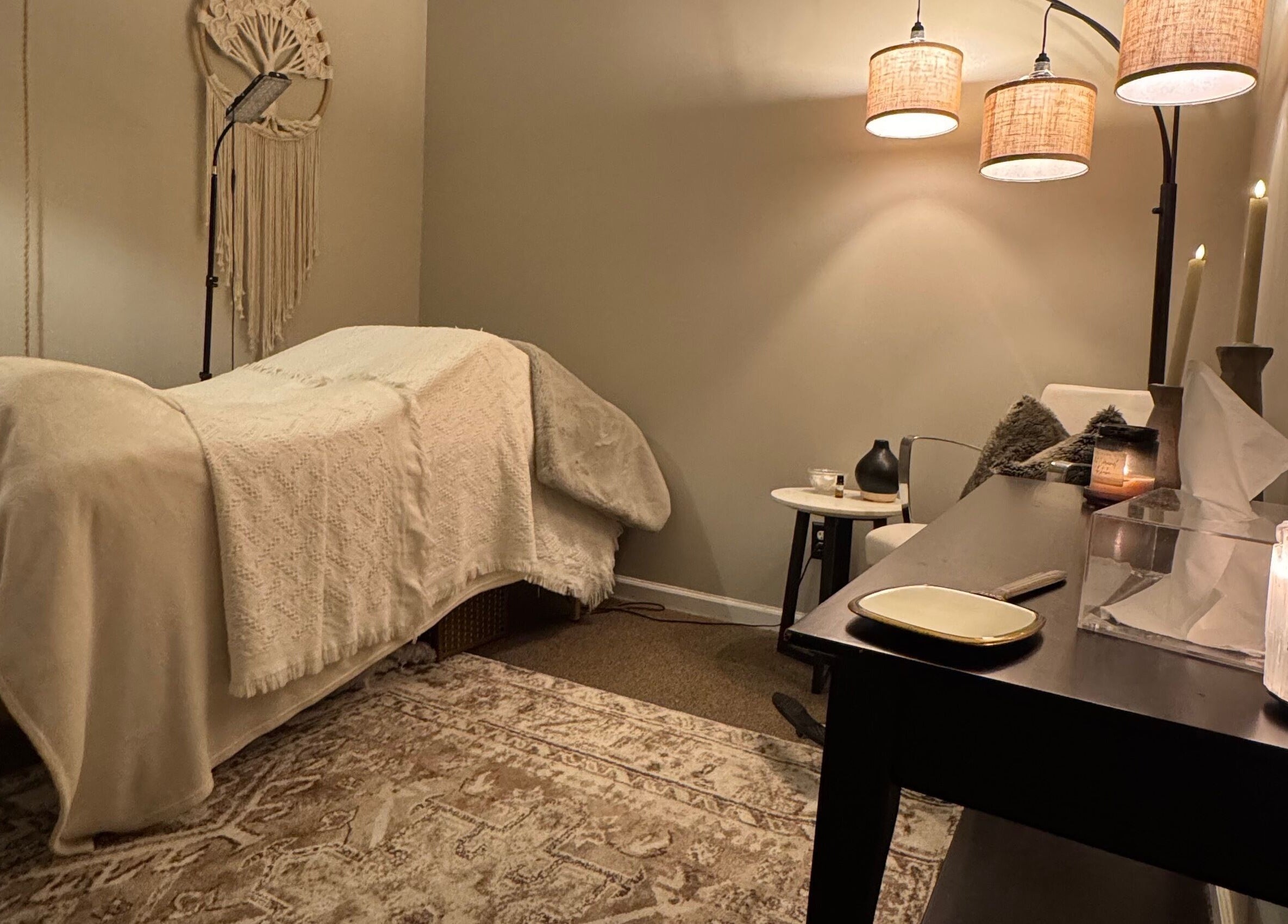 Serene spa room at Brow Babes GA in Gainesville, Georgia, US with cozy lighting and treatment table.