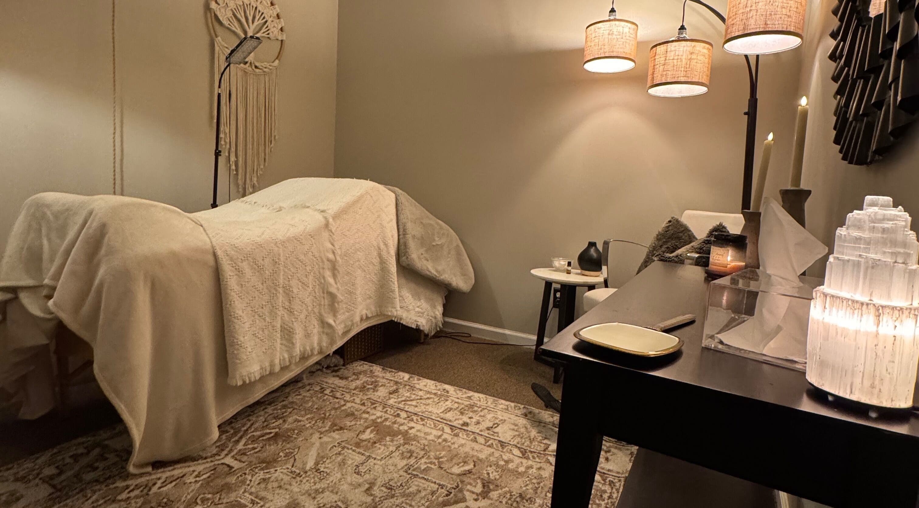 Serene spa room at Brow Babes GA in Gainesville, Georgia, US with cozy lighting and treatment table.