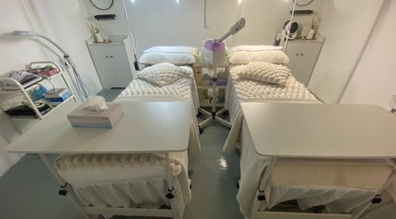 Relaxing treatment beds at The Facespa in Jitra, Kedah, MY offering a serene beauty experience.