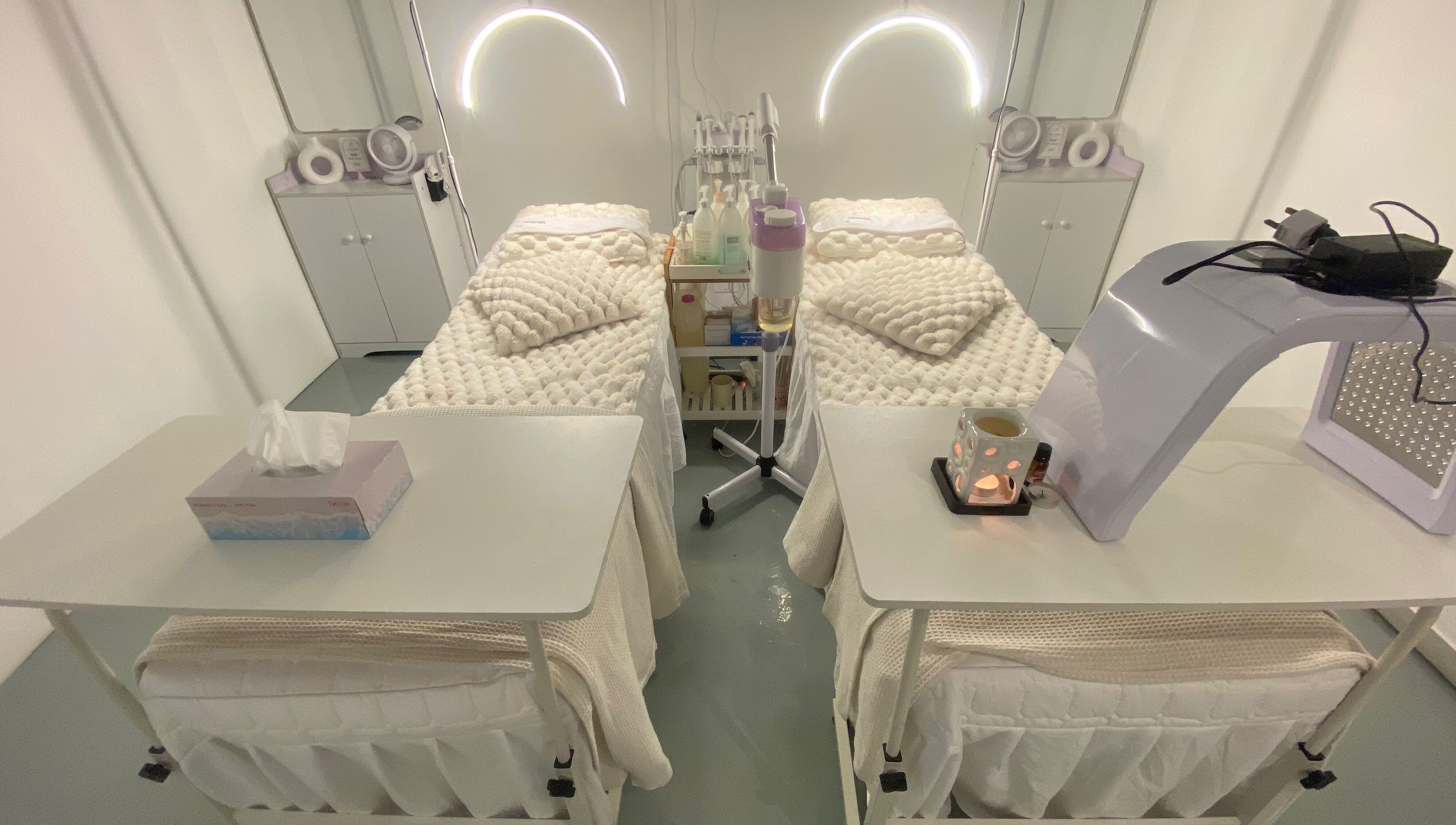 Cozy treatment beds at THE FACESPA, Jitra, Kedah, MY, offering tranquility and relaxation in a serene setting.