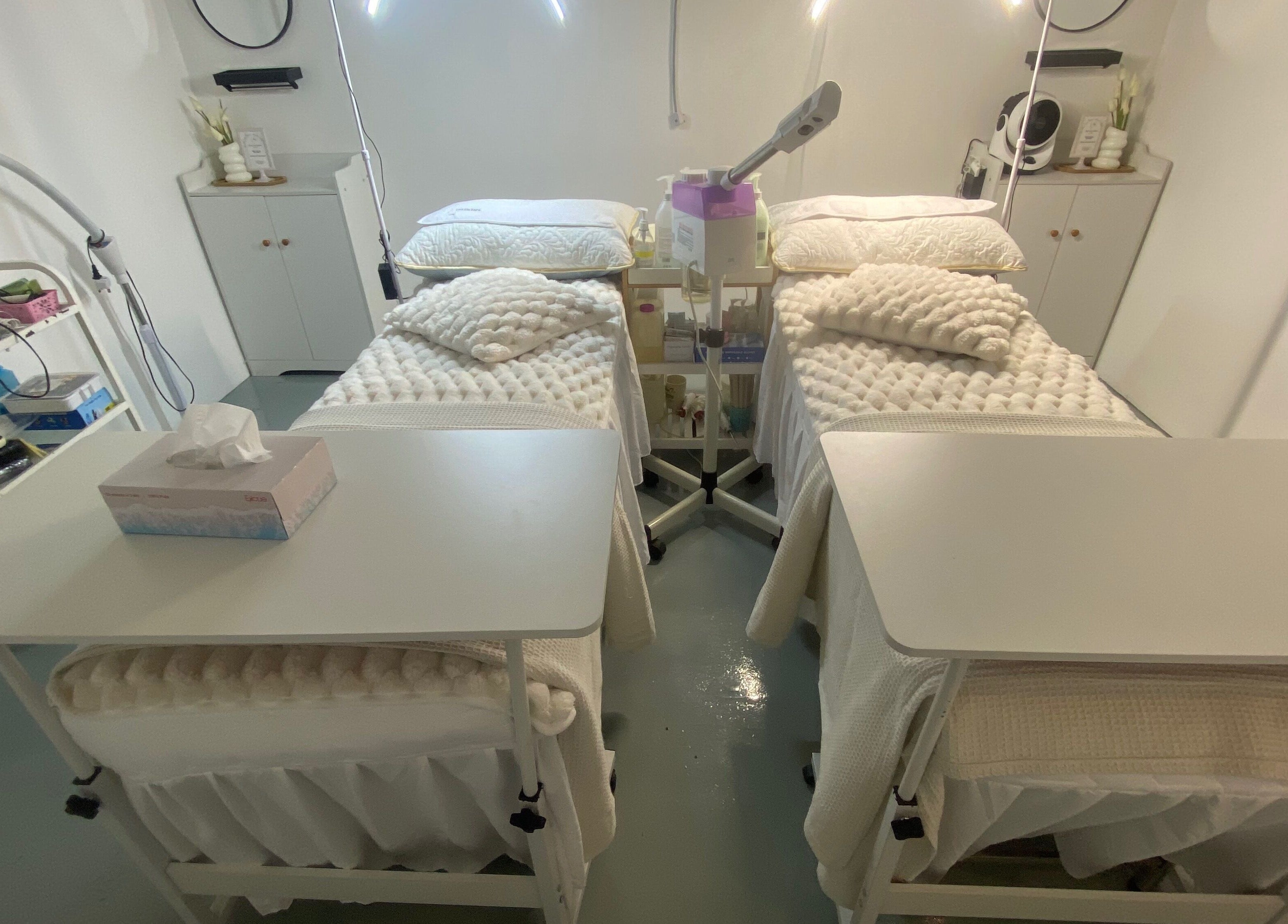 Elegant treatment room at THE FACESPA, Jitra, Kedah, MY with comfortable beds and soft lighting.