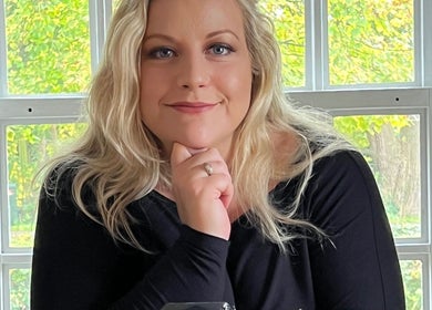 A smiling professional at Louise Pynen Advanced Beauty & Aesthetics Ltd in Emsworth, England, GB.