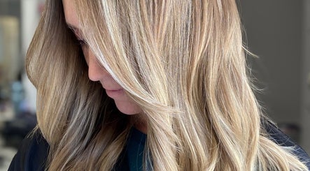 Close-up of layered blonde hair at Bridget Nottingham Hair Design, Huntington Beach, California, US.