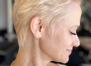 Short blonde pixie haircut at Bridget Nottingham Hair Design, Huntington Beach, California, US.