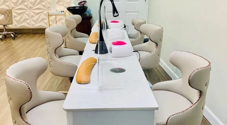 Luxurious nail care station at De'Bleu Hair Salon and Spa, Savannah, Grand Cayman, KY, featuring chic seating.