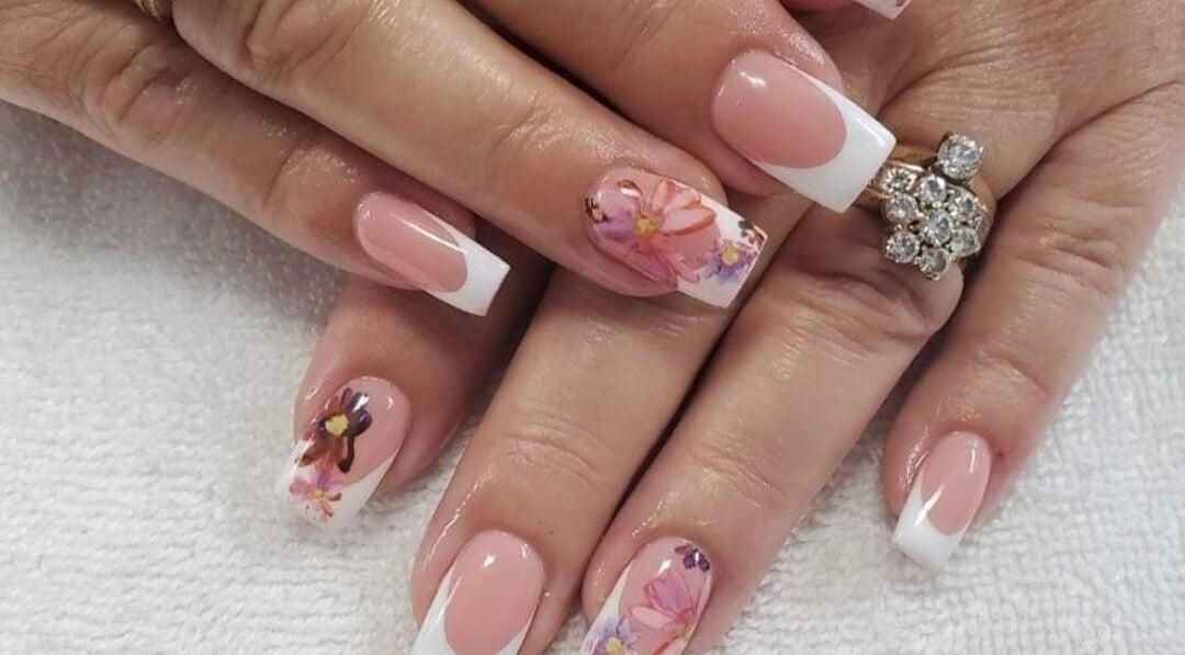 Elegant floral nail art at Sugar and Spice Esthetics, Ponoka, Alberta, CA. Perfect for beauty enthusiasts.