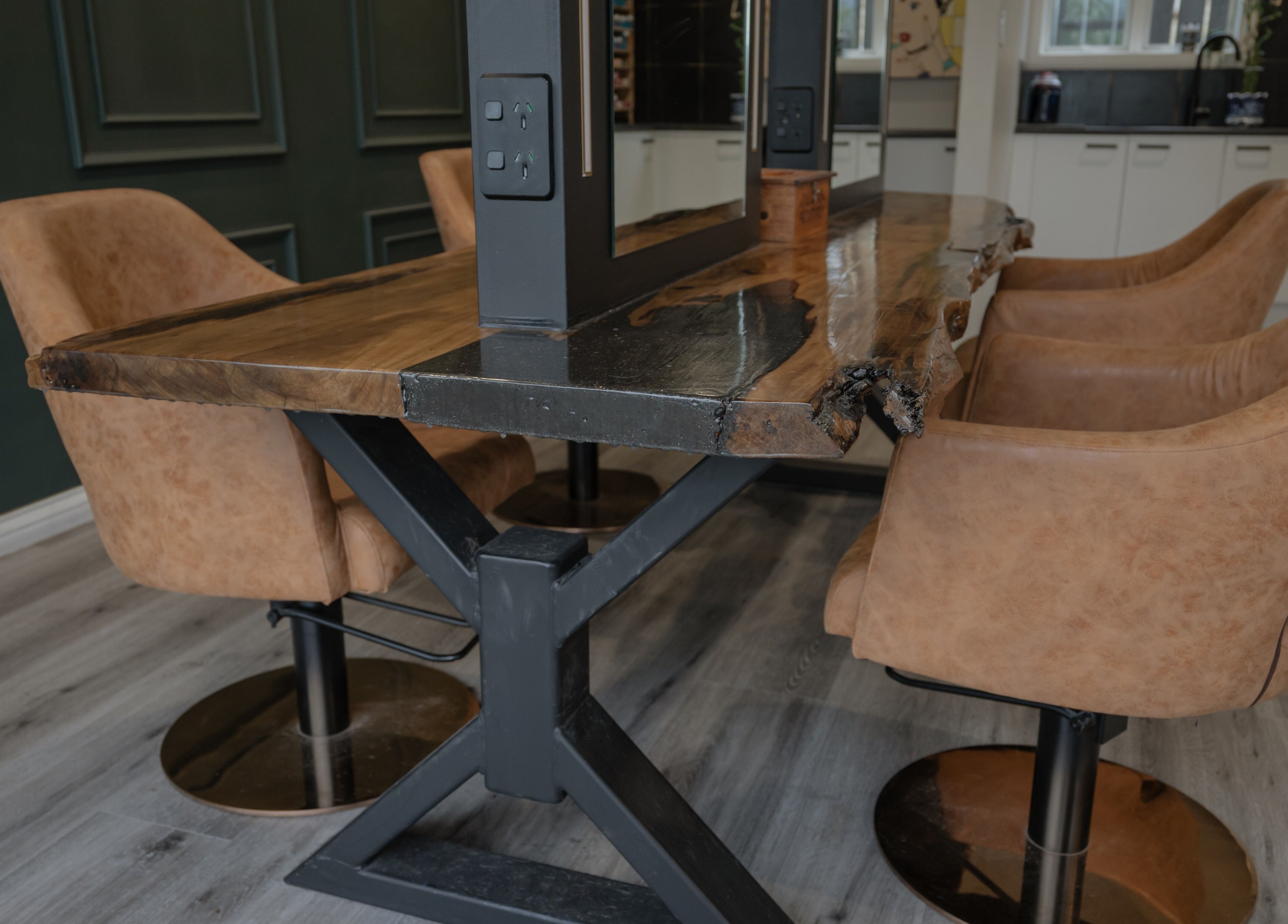 Wooden styling station at Scarlet Hair Studio, Tauranga, Bay of Plenty, NZ enhancing salon's cozy ambiance.