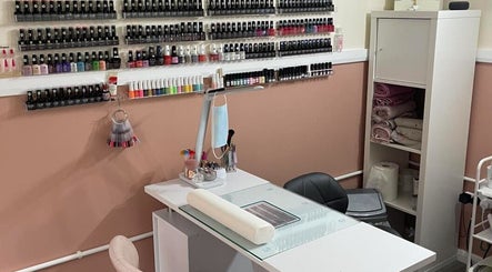 Nail station at House of Beauty by Tanya, Peterborough, England, showcasing polish collection and tools.