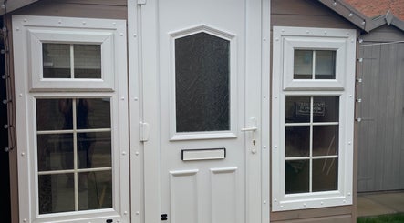 Inviting entrance of House of Beauty by Tanya in Peterborough, England, GB featuring elegant windows and door.