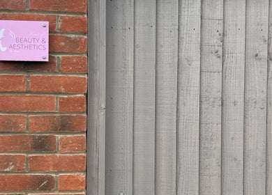 Signage of House of Beauty by Tanya in Peterborough, England, GB, on a brick wall.