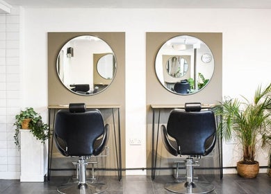 Chic salon chairs and mirrors at Willow Hair and Wellbeing, Woodbury, England, GB.