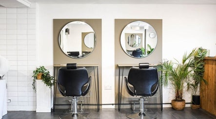 Chic salon chairs and mirrors at Willow Hair and Wellbeing, Woodbury, England, GB.