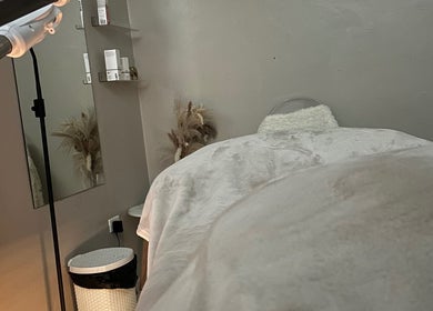 Cozy treatment room at Solitude Esthetics, Bridgetown, Christ Church, BB, featuring soft lighting and decor.