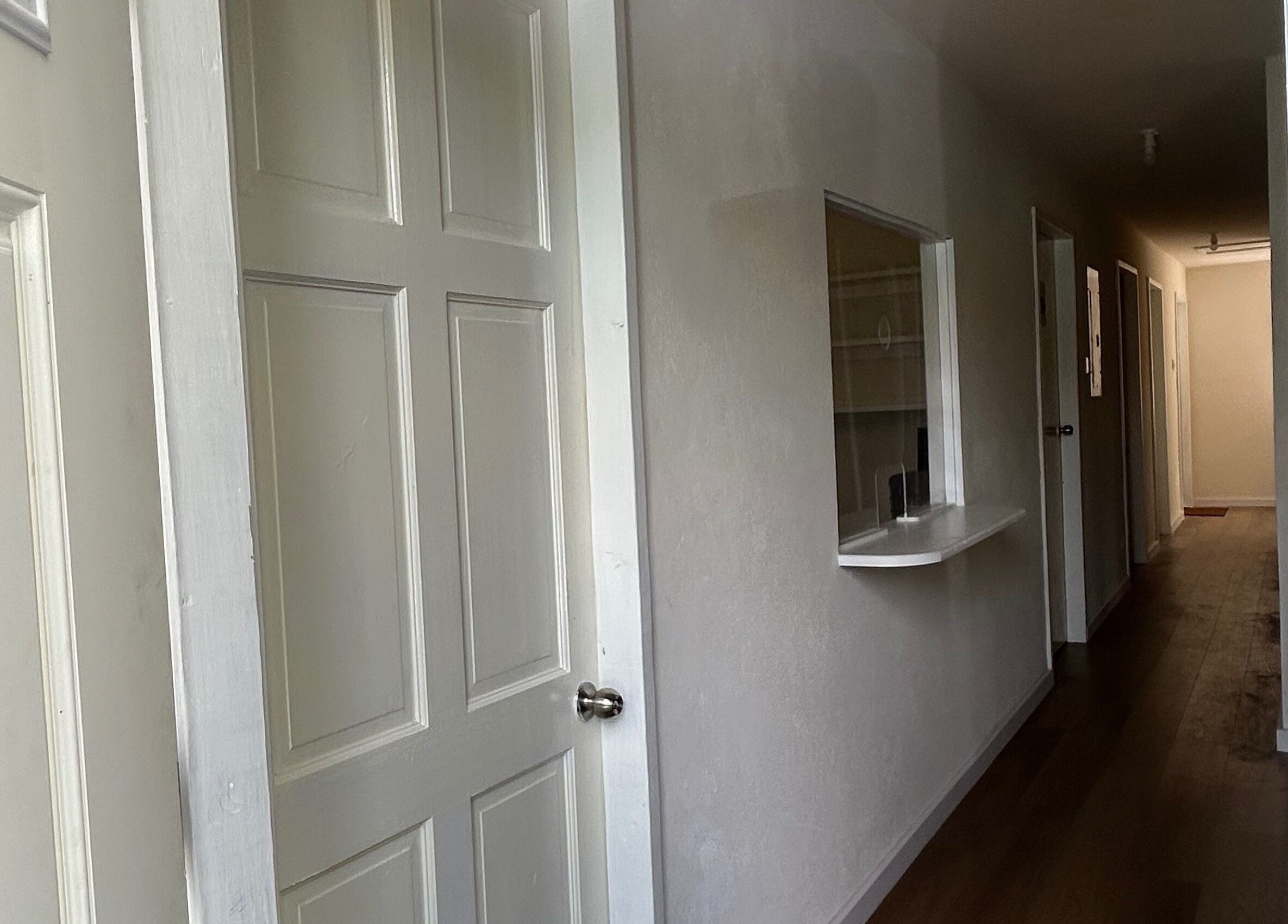 Serene hallway at Solitude Esthetics in Oistins, Christ Church, BB, inviting calm and relaxation.