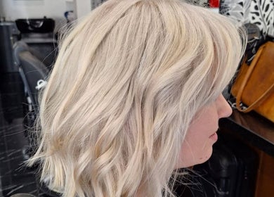 A stylish blonde hairstyle at Hair by Irian in Johannesburg, Gauteng, ZA, showcasing expert salon care.