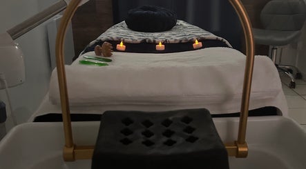 Relaxing treatment room with candles at The Facial Spa at Bank House, Llantwit Major, Wales, GB.