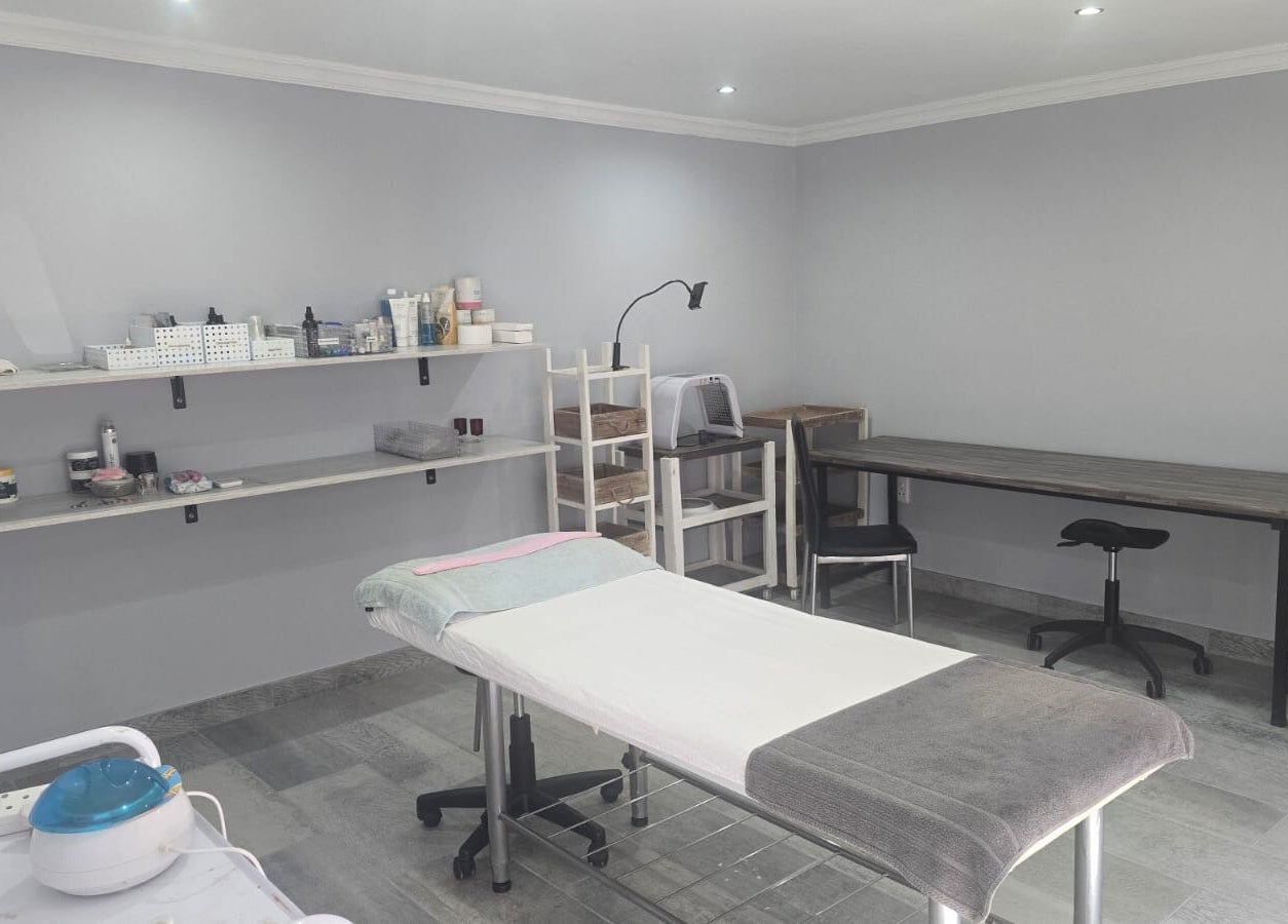 Tranquil treatment room at Studio A - Skin Aesthetics in Roodepoort, Gauteng, ZA, featuring cozy massage bed.