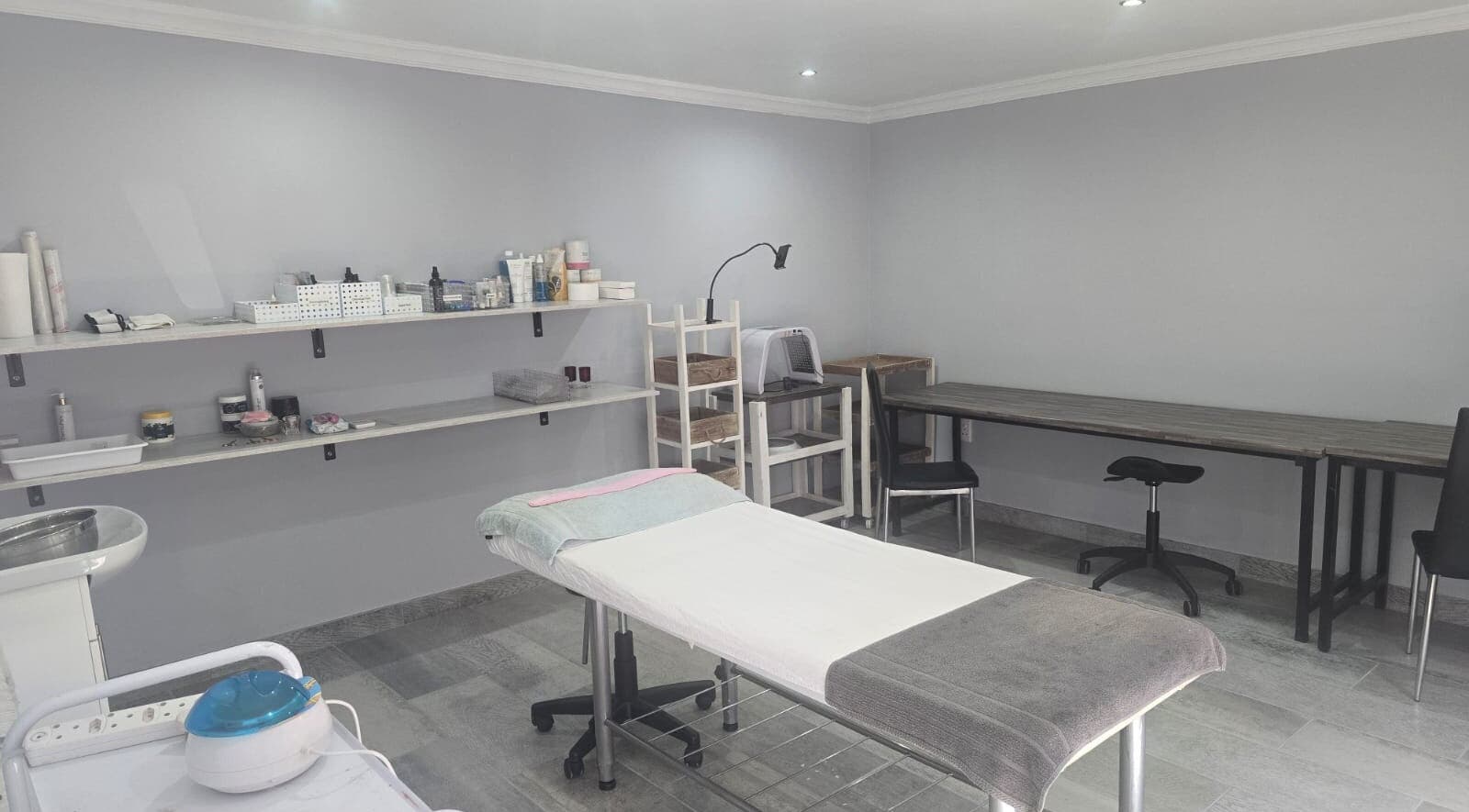 Tranquil treatment room at Studio A - Skin Aesthetics in Roodepoort, Gauteng, ZA, featuring cozy massage bed.
