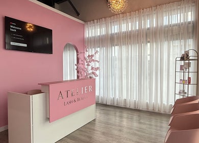 Elegant reception at The Beauty Nurs, Edmonton, Alberta, CA. Modern pink decor with a welcoming ambiance.