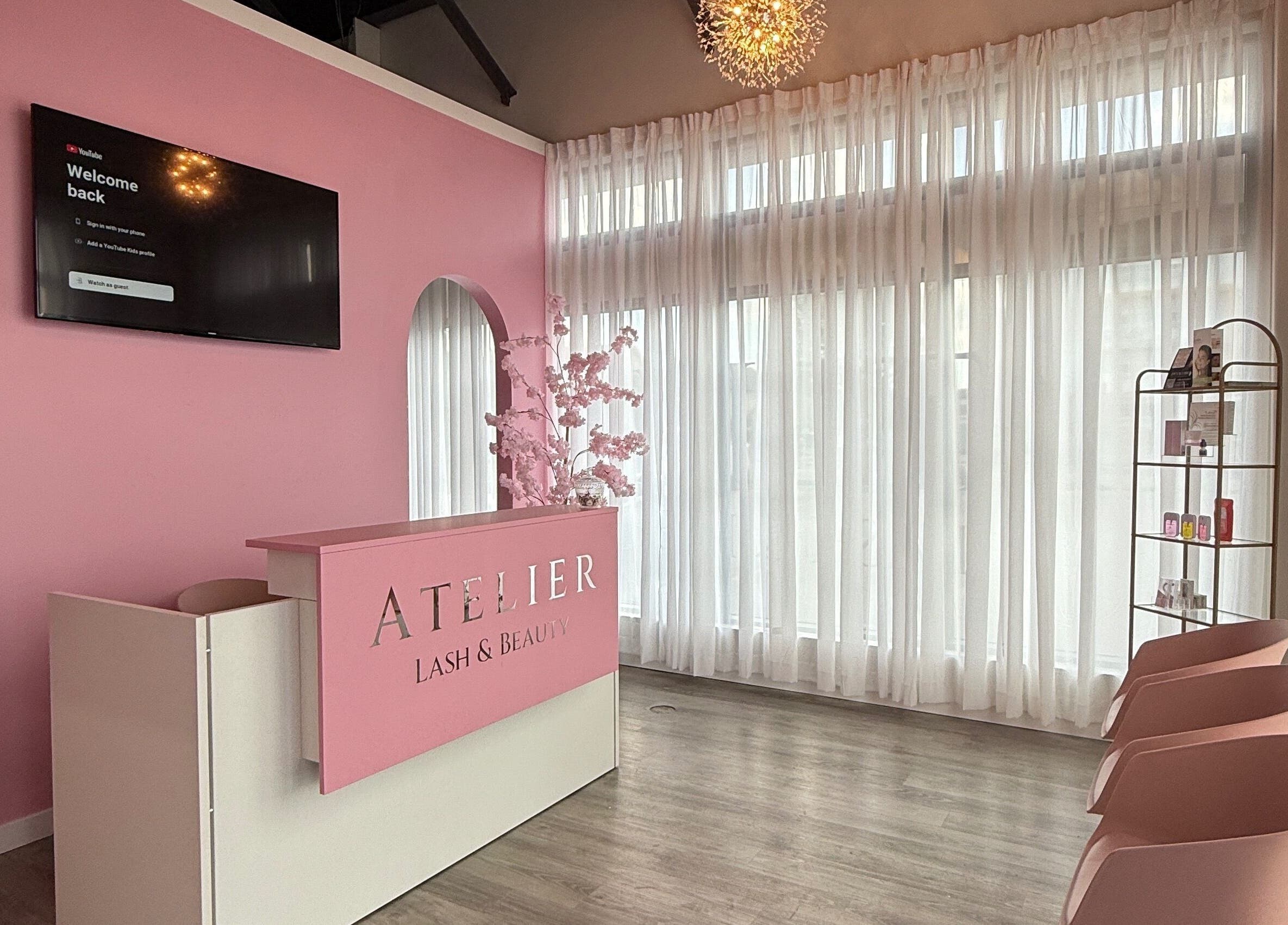 Elegant reception at The Beauty Nurs, Edmonton, Alberta, CA. Modern pink decor with a welcoming ambiance.
