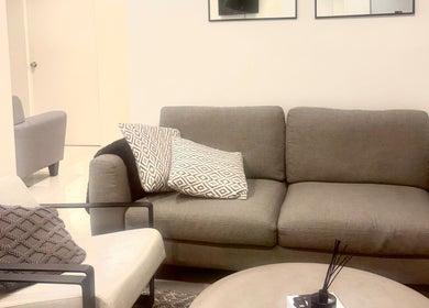 Cozy seating area at The Beauty Room by Taylor Marie, Parramatta, New South Wales, AU.
