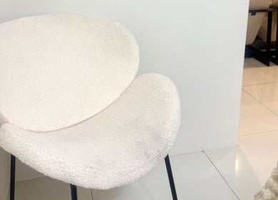 Elegant white chair at The Beauty Room by Taylor Marie, Parramatta, New South Wales, AU.
