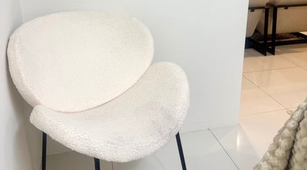 Elegant white chair at The Beauty Room by Taylor Marie, Parramatta, New South Wales, AU.