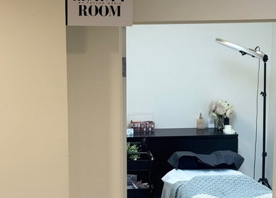 Entrance to The Beauty Room by Taylor Marie, Parramatta, NSW showcasing a serene treatment area.