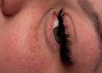 Close-up of eyelash extensions at Vela Lash Bar, Jacksonville, Florida, US showcasing volume and precision.