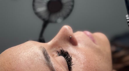 Close-up of elegant eyelash extensions at Vela Lash Bar, Jacksonville, Florida, US.