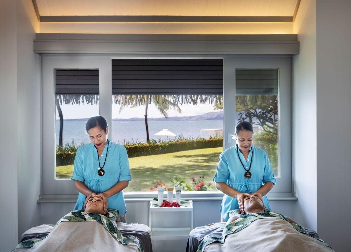 Relax in the tranquil spa room at Sofitel Fiji Resort & Spa, Denarau Island, Western Division, with a scenic ocean view.