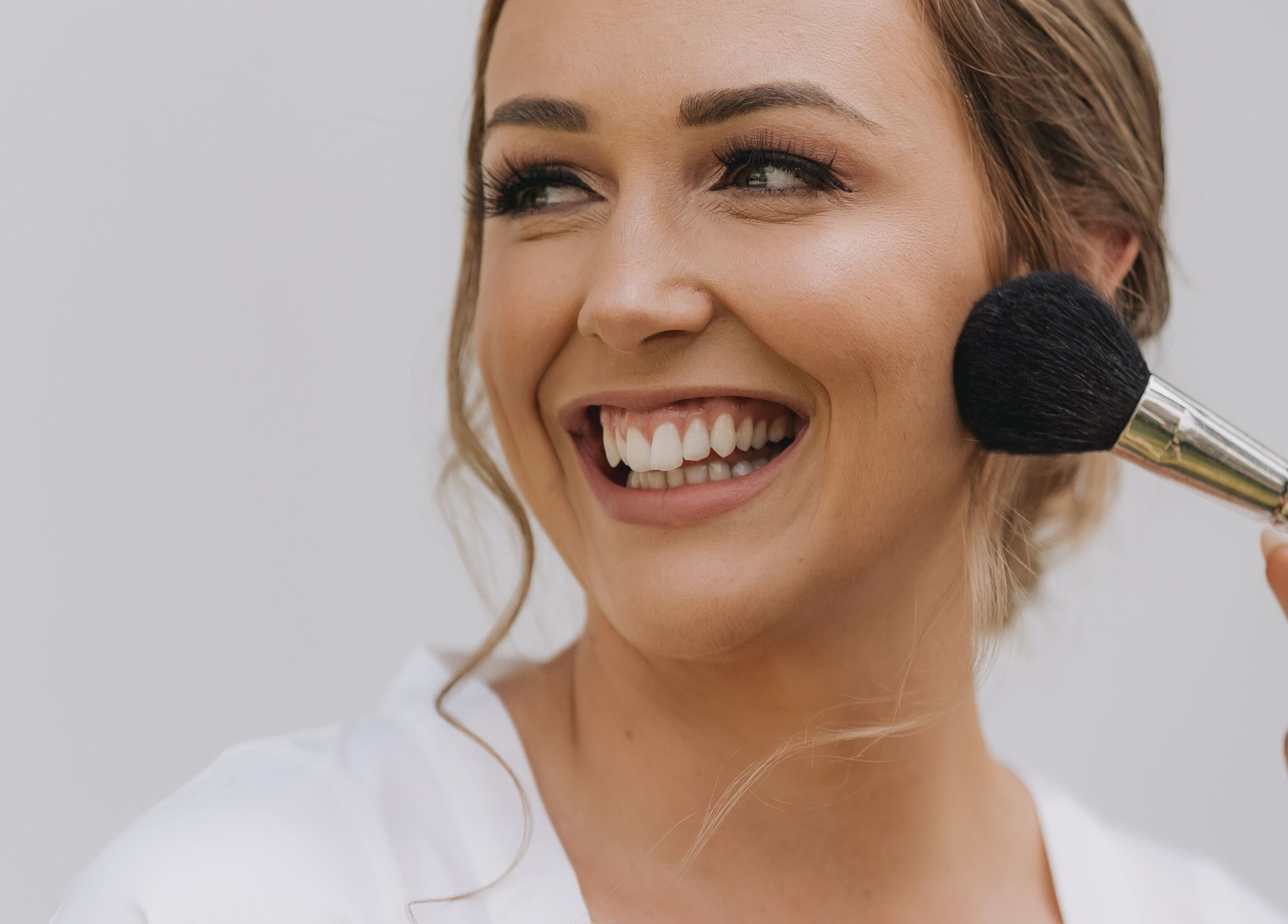 Guest at Sofitel Fiji Resort & Spa receives makeup on Denarau Island, Western Division, FJ, showcasing beauty services.