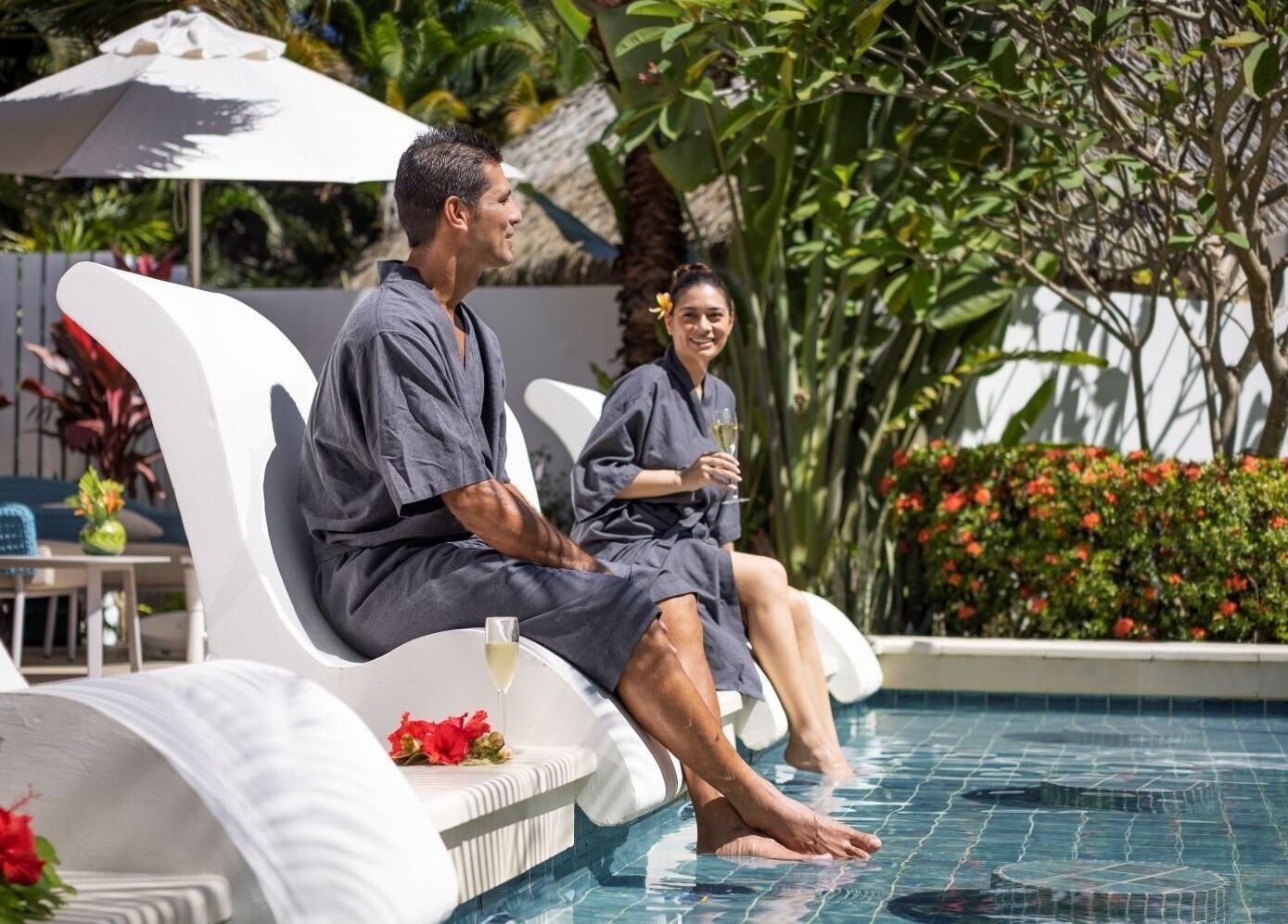 Guests relaxing by the pool at Sofitel Fiji Resort & Spa, Denarau Island, Western Division, FJ.