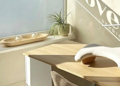 Kyra Dennison Nails in Plymouth, England offers a tranquil nail station with natural lighting and greenery.
