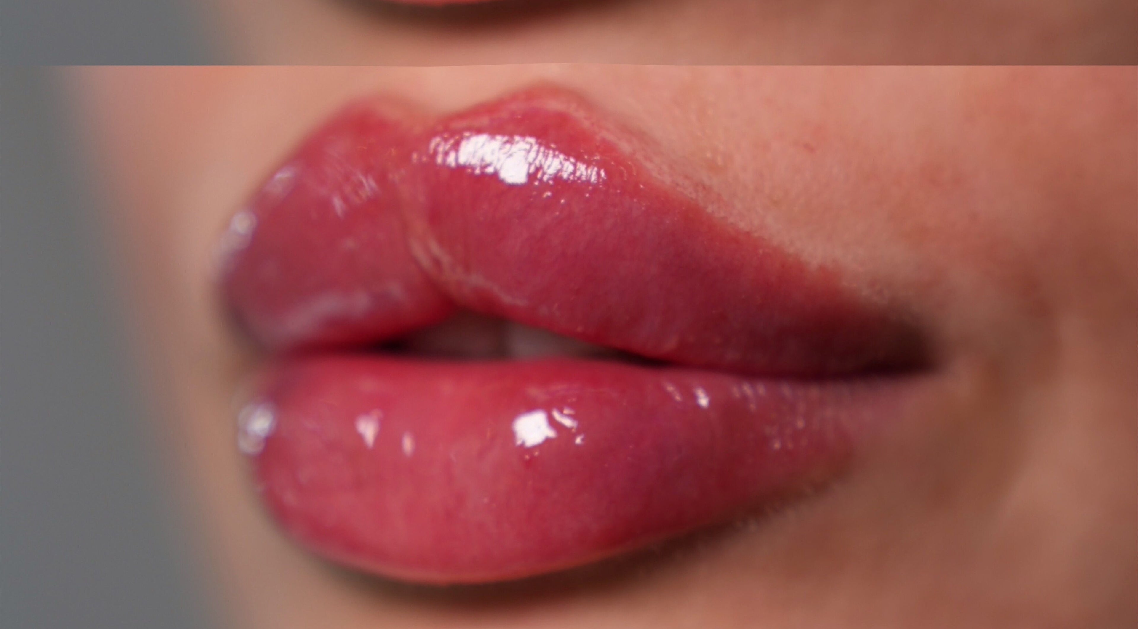 Close-up of glossy lips at Face by Demi in Hook, England, GB, showcasing expert lip enhancement.