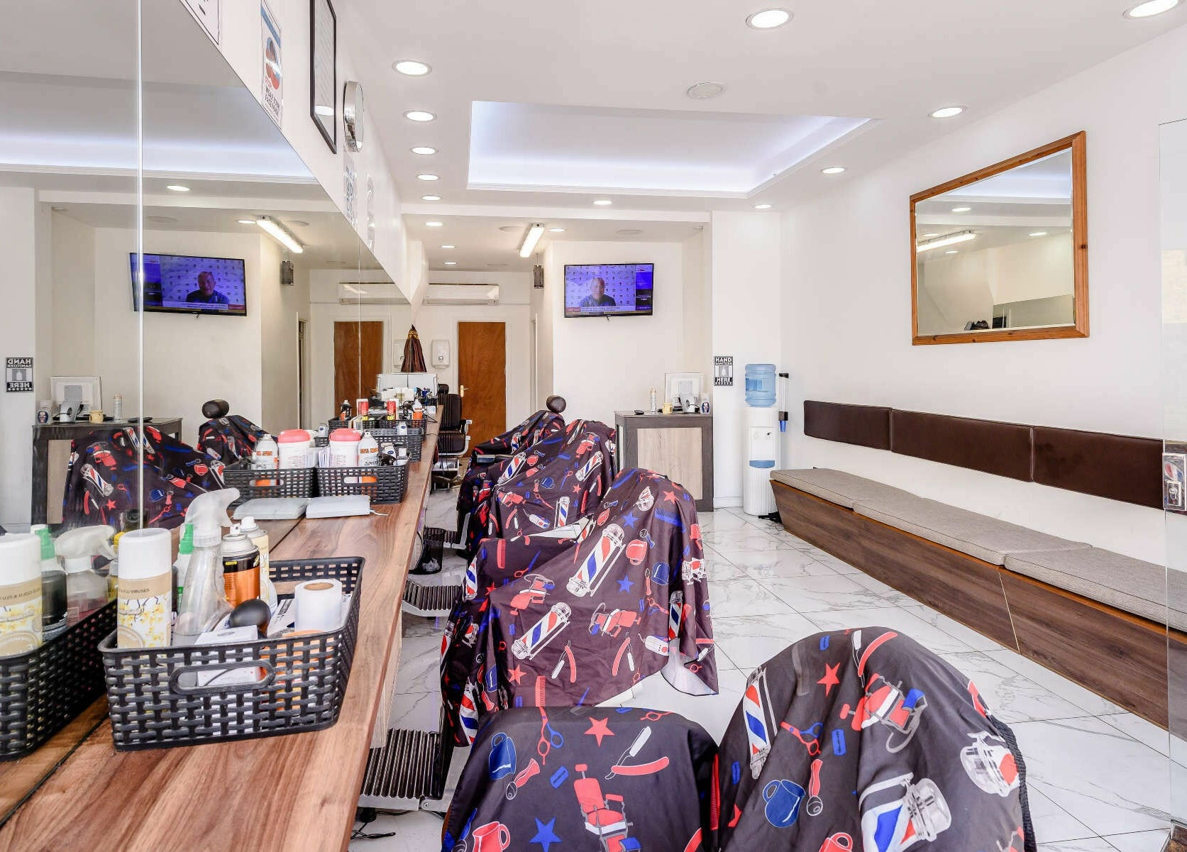 Interior of Clean Cuts London showcasing modern salon chairs and mirrors, located in London, England, GB.